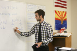 An instructor teaching mathematics