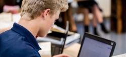 boy working on a computer